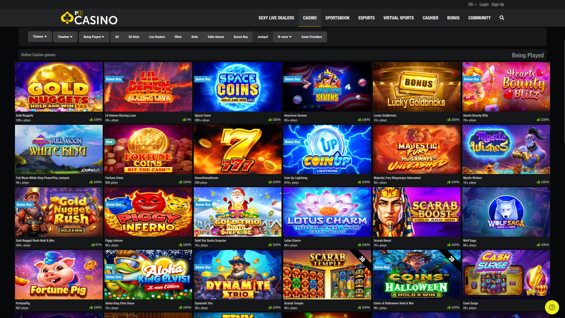 PHPASAY Casino slot game selection with colorful reels on a dark premium interface